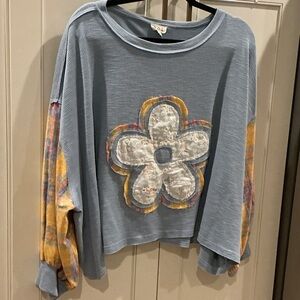 Ladies whimsical pullover. Light and loose fit. Size medium.